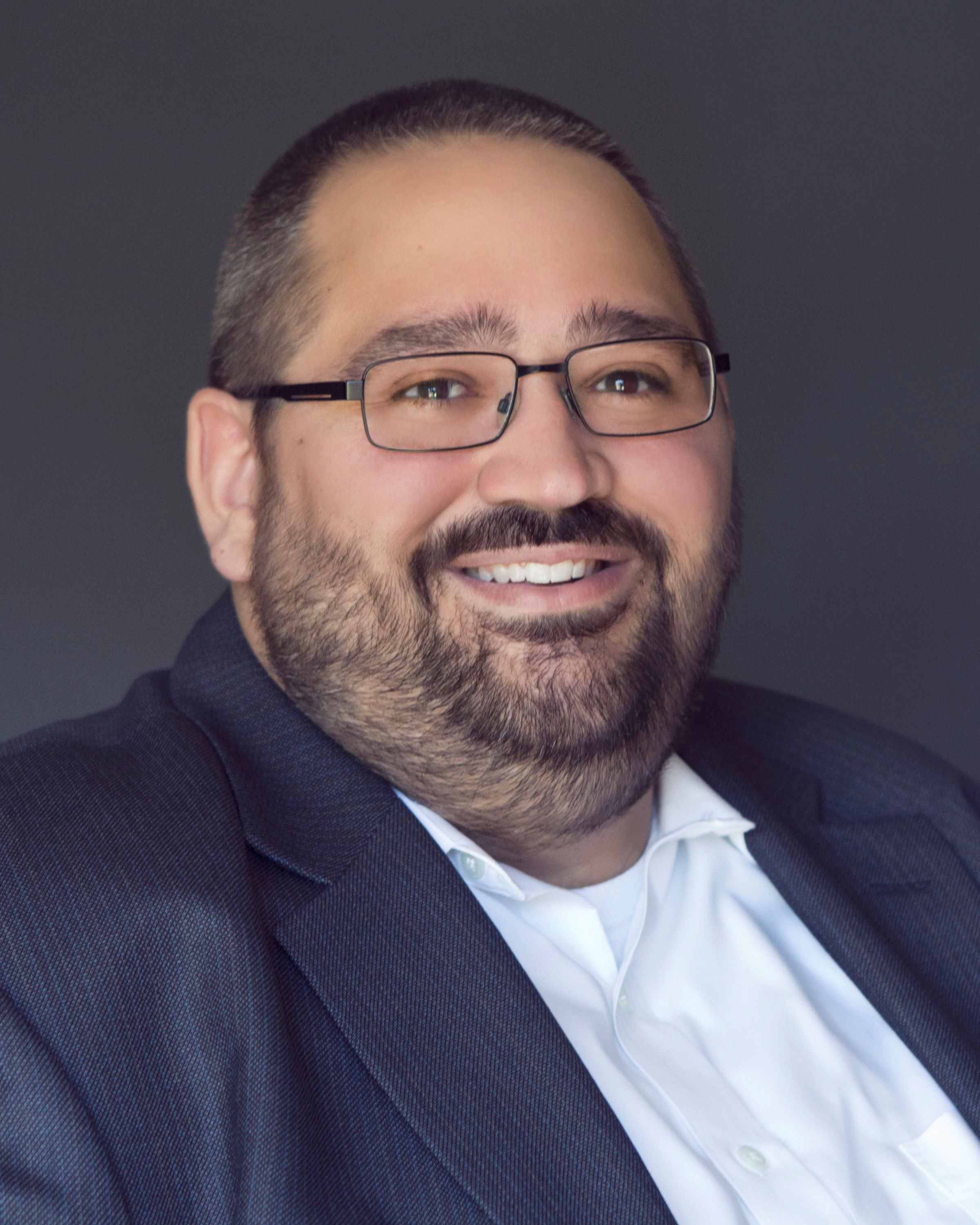 Professional headshot of Ben Story