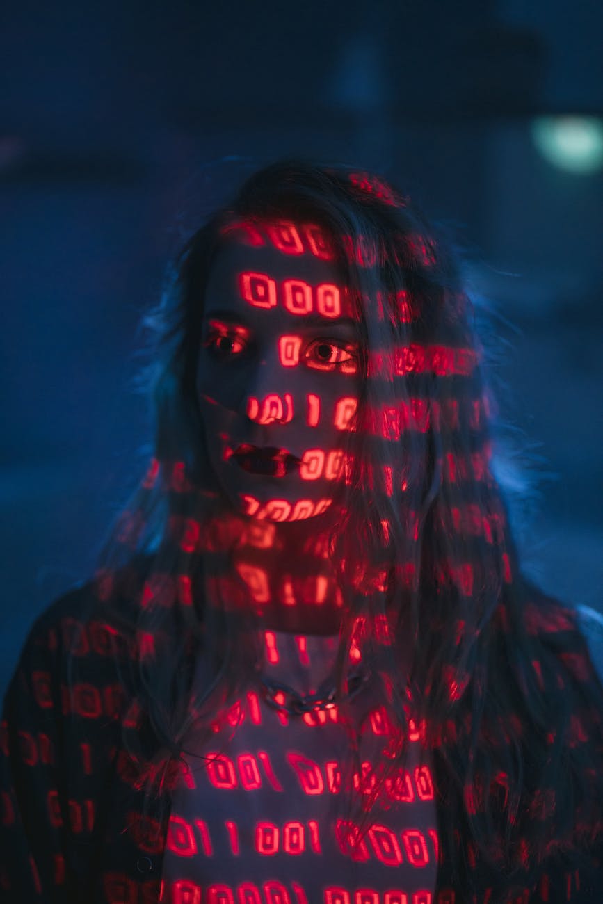 woman with red light on face